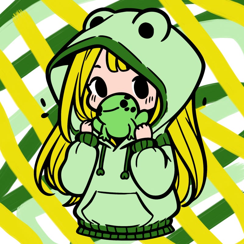 a girl holding a froggy hoodie