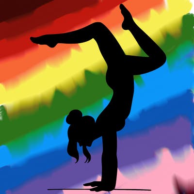 a woman doing a handstand