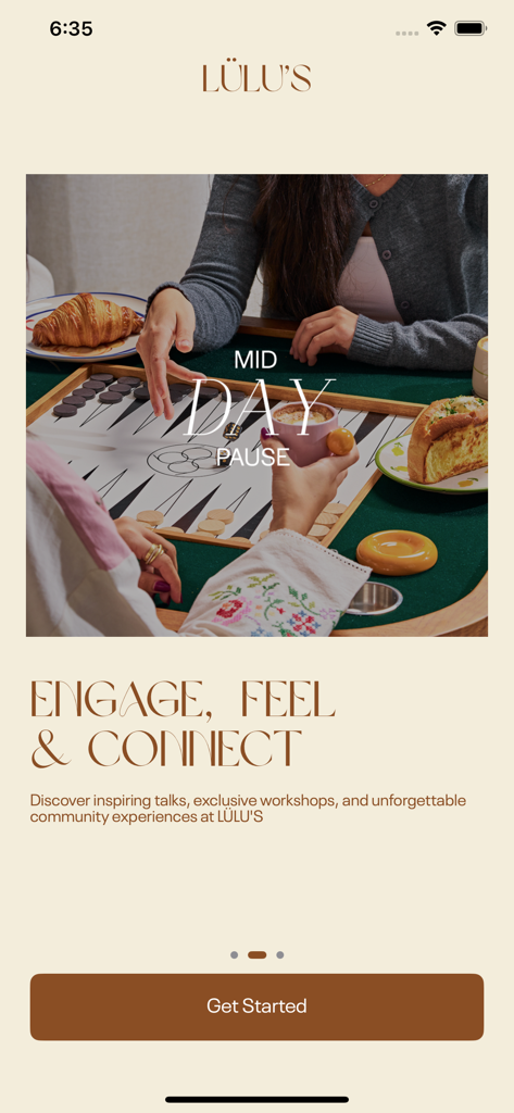 LÜLU'S - Lulus app onboarding screen featuring a lifestyle image of people connecting over food and games with a call to action to get started.