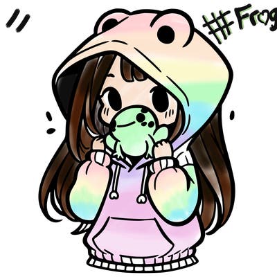 a girl holding a froggy hoodie