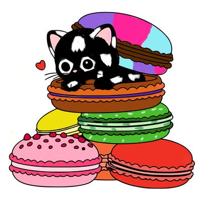 a kitten popping out of a stack of pastel macarons