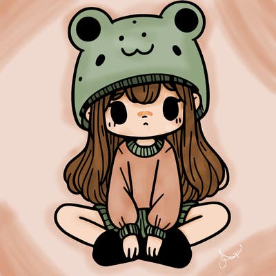 a girl wearing a frog hat and some frog socks