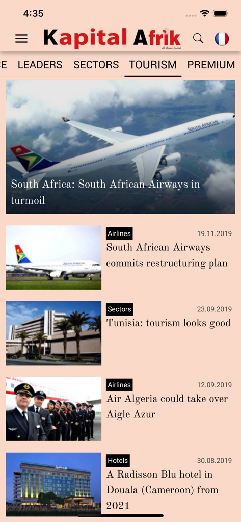 Financial Afrik - Financial Afrik app interface showing the tourism news section with articles about African airlines and hotels.