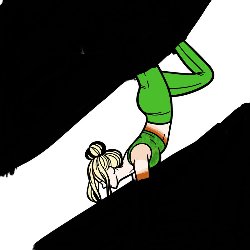 a woman doing a handstand