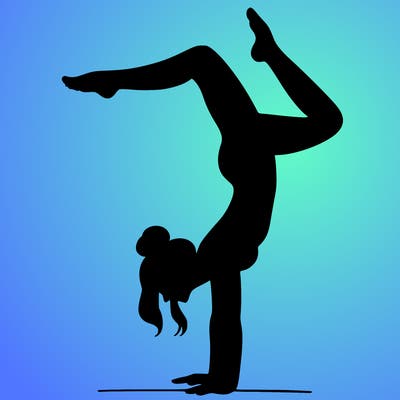 a woman doing a handstand