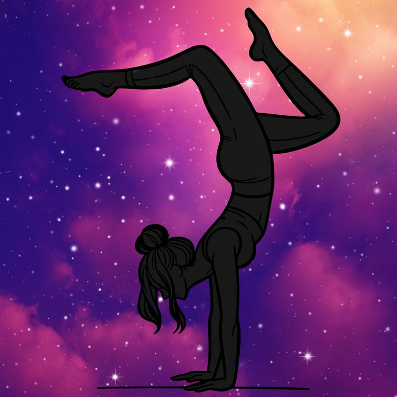 a woman doing a handstand