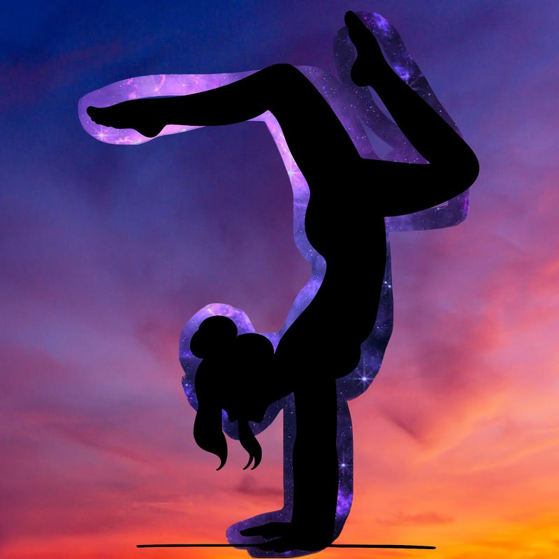 a woman doing a handstand