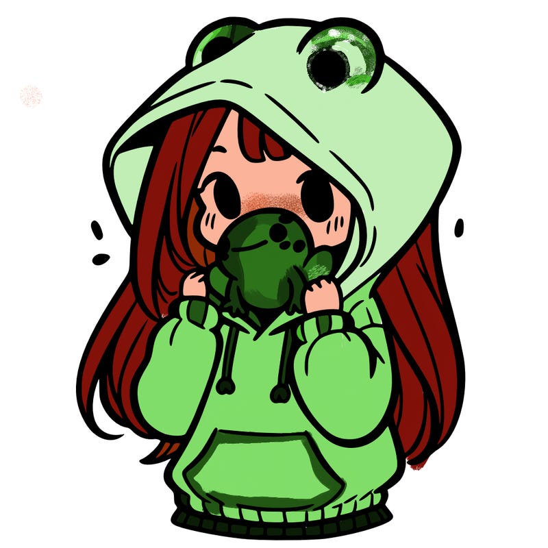 a girl holding a froggy hoodie