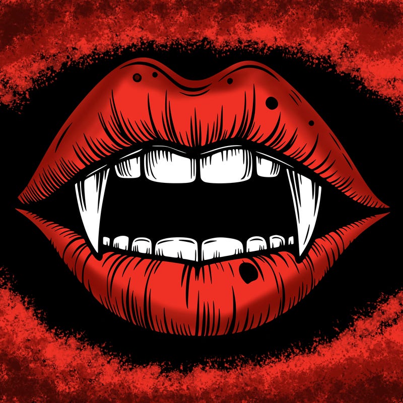 lips with vampire teeth