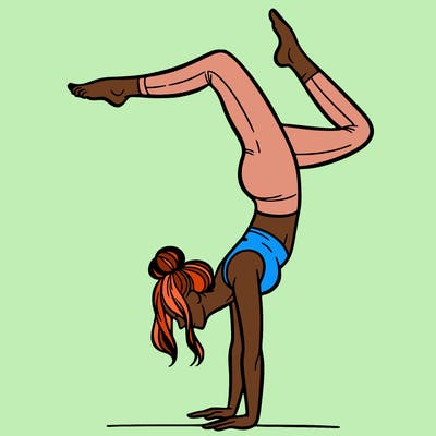a woman doing a handstand