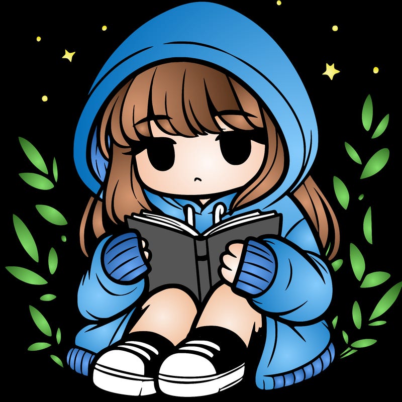 girl in oversized hoodie reading a book