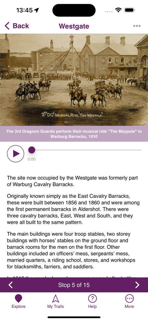 Historical tour page in the Places and Trails app showing the history of Warburg Cavalry Barracks with a 1910 photograph.
