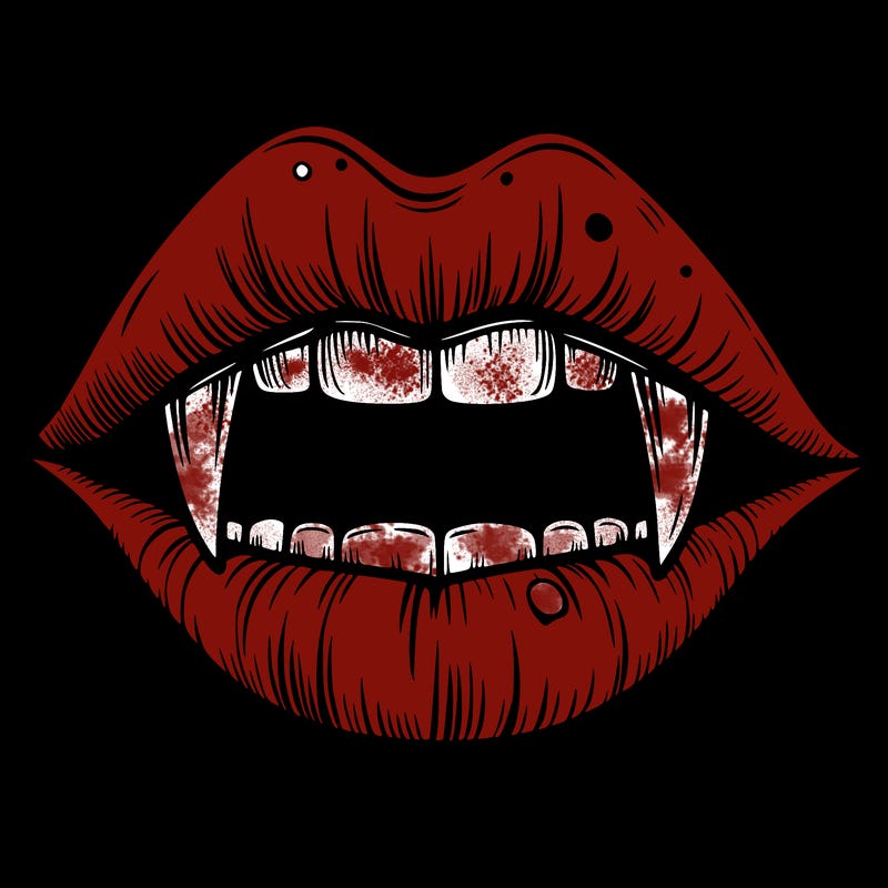 lips with vampire teeth