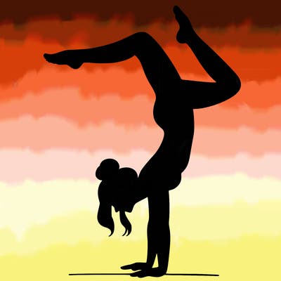 a woman doing a handstand