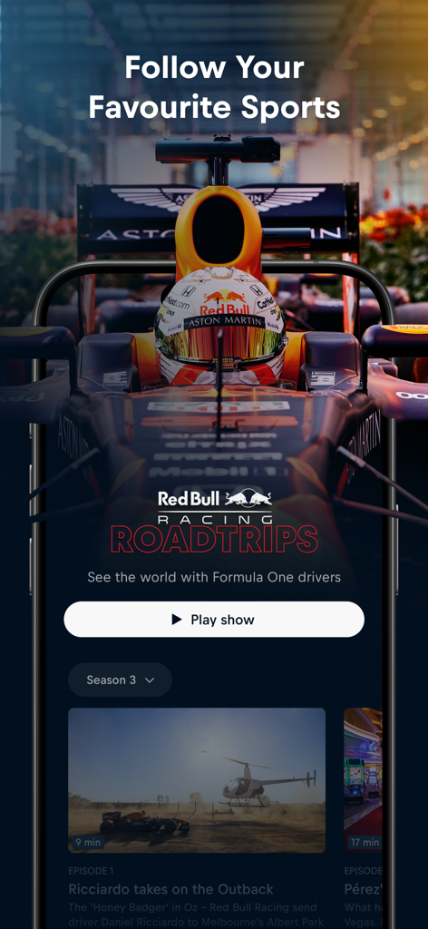 Red Bull TV: Watch Live Events - 레이싱카와 재생 버튼이 있는 Formula One Racing Roadtrips 쇼를 보여주는 Red Bull TV 앱 인터페이스