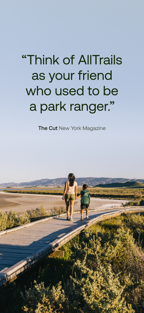 A mother and child walking on a wooden boardwalk in nature with a quote comparing AllTrails to a park ranger