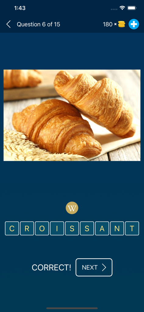 Food Quiz: Guess the Food - Gameplay screenshot of Food Quiz showing a photo of croissants with the word correctly spelled