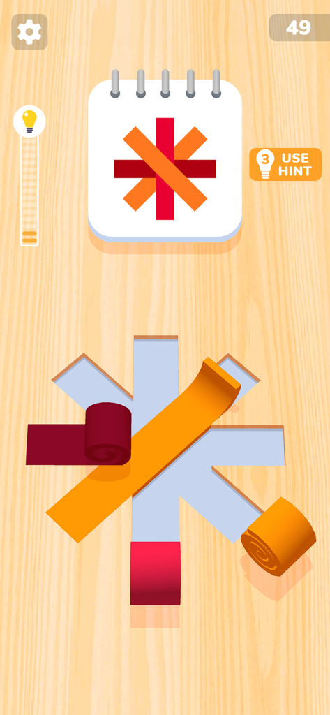 Color Roll 3D: Puzzle Art Game - Color Roll 3Dのゲームプレイ、ターゲットパターンに合わせるためにロールされた色付きロールの配置を示す