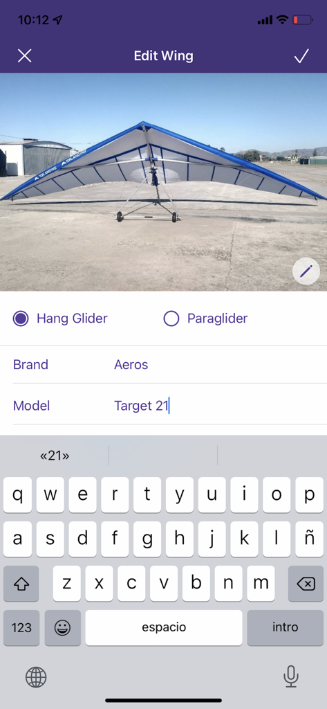 Volandoo Tracker - Interface of Volandoo Tracker app showing the Edit Wing screen with a hang glider photo and equipment details
