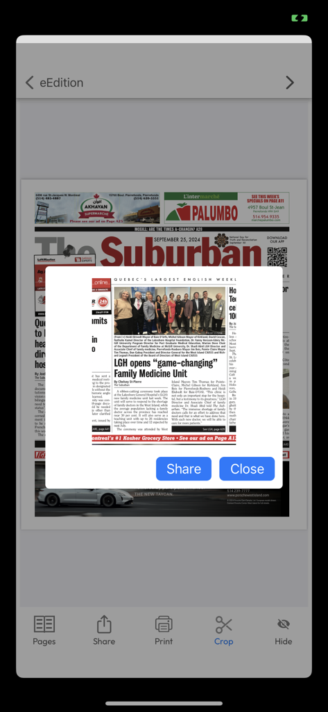 Screenshot of The Suburban Newspaper app eEdition showing a cropped article with share and close buttons.