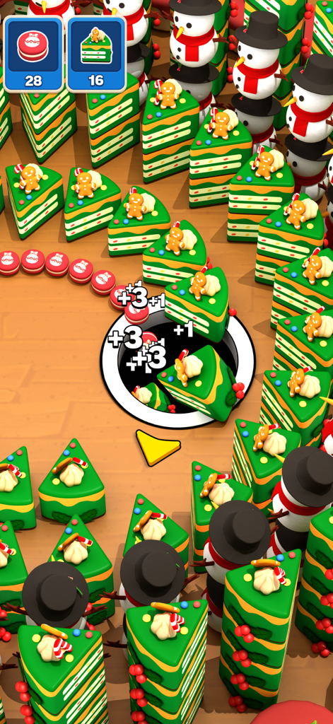 A black hole swallowing Christmas cake slices and ornaments in a puzzle level of Holy Hole.