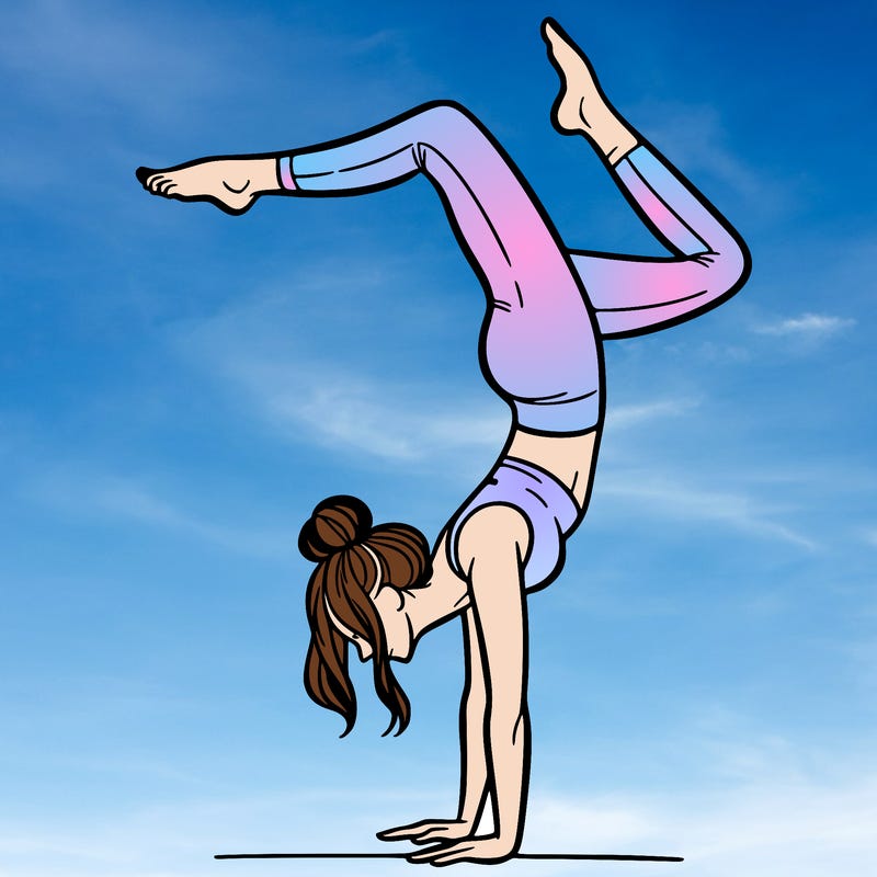a woman doing a handstand
