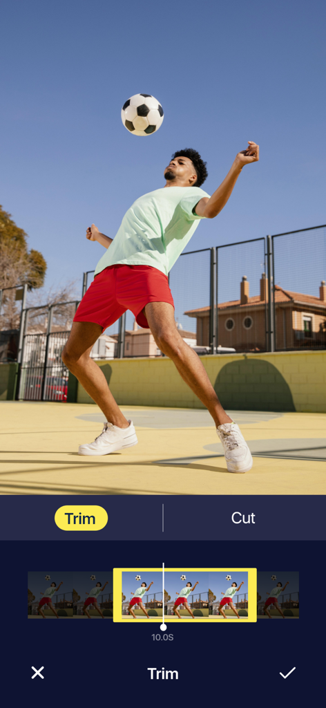 Video Editor & Maker For YT - Smartphone screen showing the trim and cut video editing tools with a soccer video clip