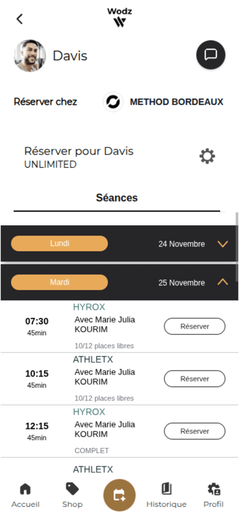 Wodz - Mobile app interface for Wodz showing a daily schedule of fitness classes with booking options
