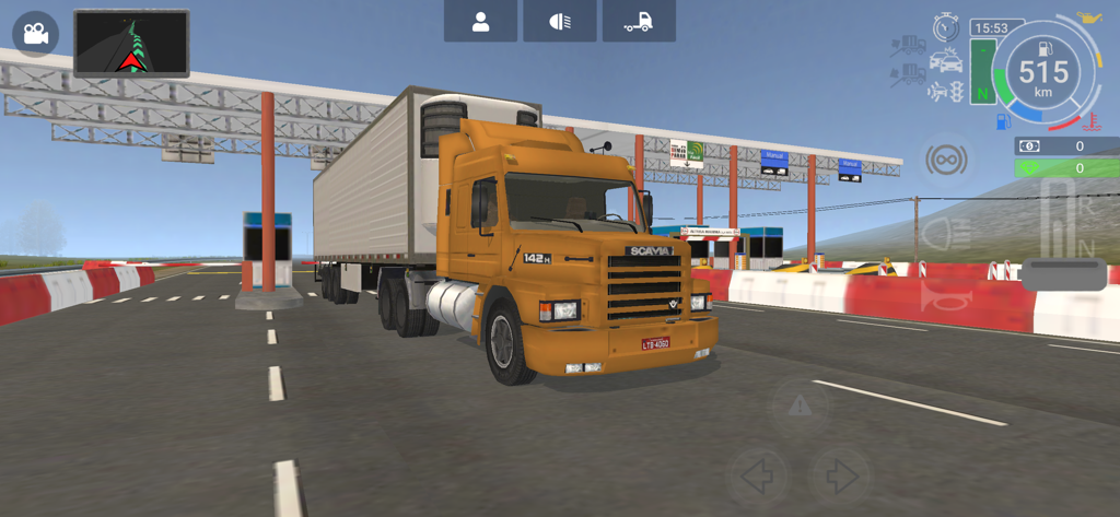 Grand Truck Simulator 2 - A yellow Scania truck with a trailer stopped at a highway toll booth in Grand Truck Simulator 2.