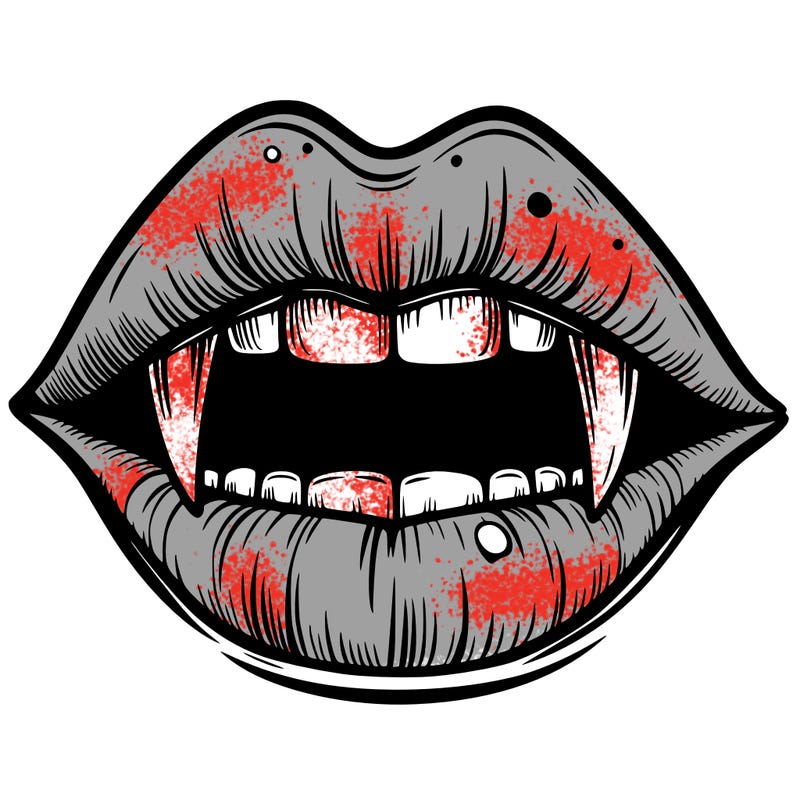 lips with vampire teeth