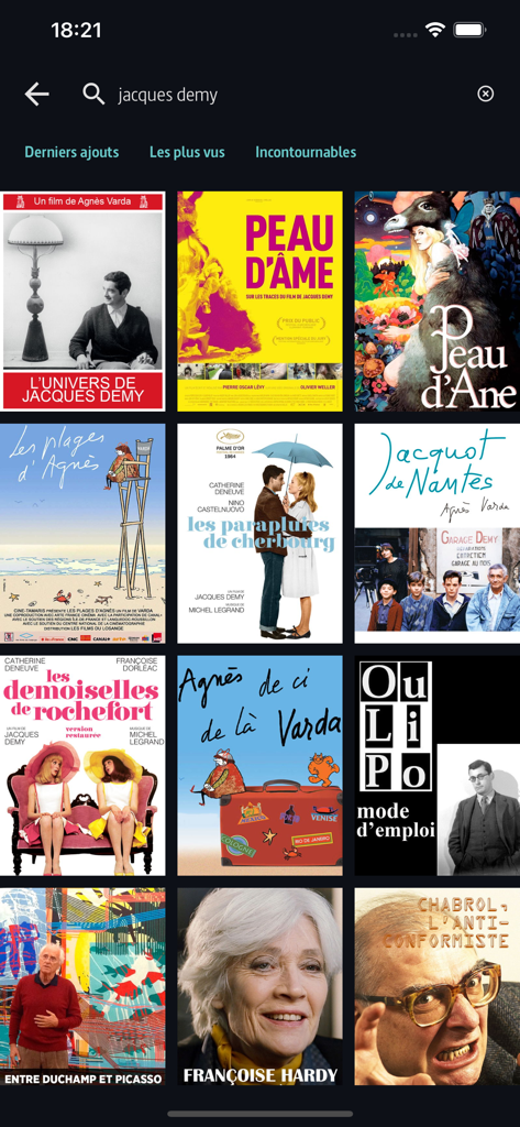 A grid of French cinema posters for director Jacques Demy on the Mediatheque Numerique app interface