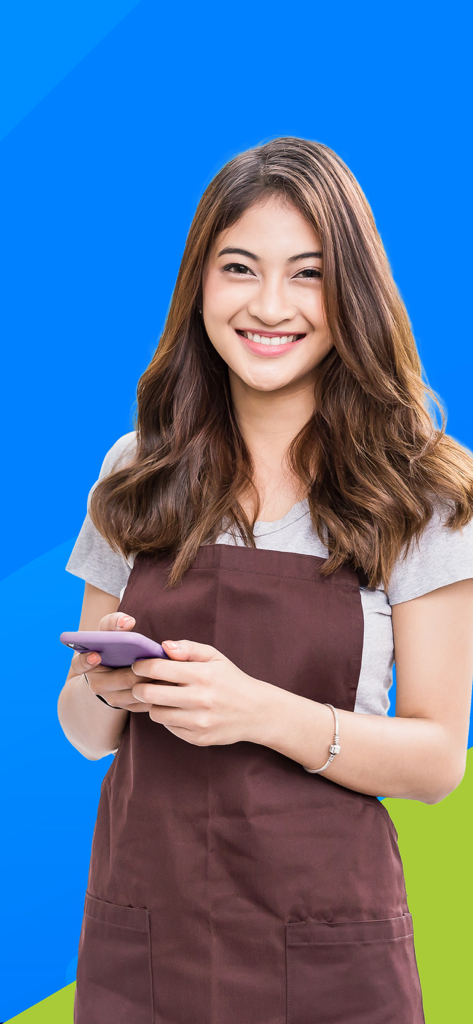 Wing Merchant - A smiling female business owner wearing a brown apron and holding a smartphone for Wing Merchant app