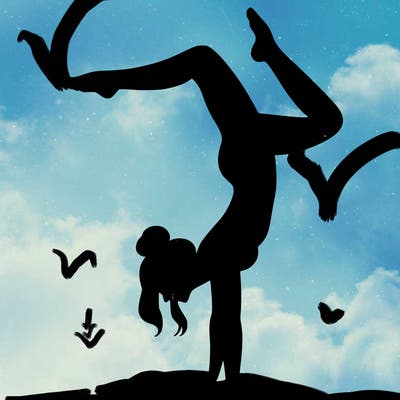 a woman doing a handstand