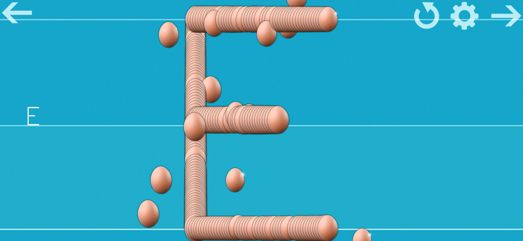 Tracing the capital letter E with egg stickers in the Writing Wizard app