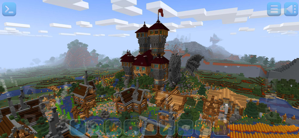 Un gran castillo y pueblo medieval de piedra construidos en el juego sandbox de RealmCraft