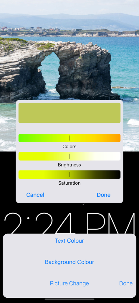 Standby Alarm Clock - Interface for customizing clock colors and brightness over a scenic photo background.