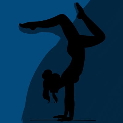 a woman doing a handstand
