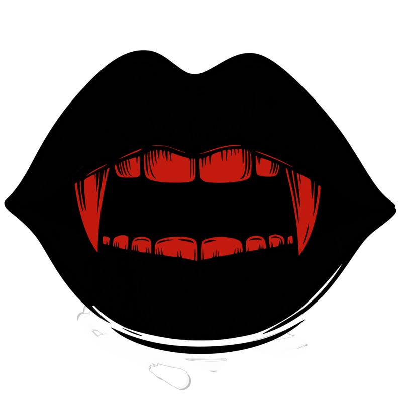 lips with vampire teeth