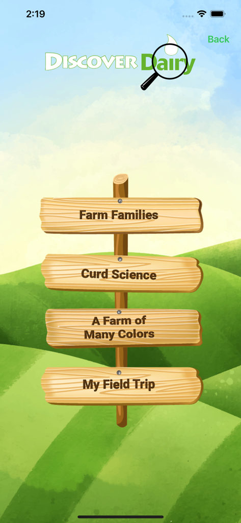 Discover Dairy educational app interface showing a wooden signpost with lesson categories like Farm Families and Curd Science.