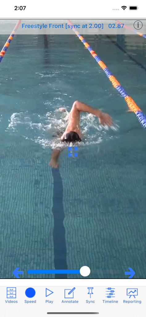 Swim Coach Plus HD - A swimmer performing a freestyle stroke being analyzed in the Swim Coach Plus HD app with technical feedback tools