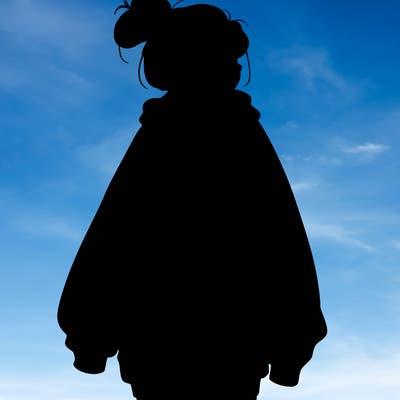 realistic girl with a oversized sweatshirt on and a bun