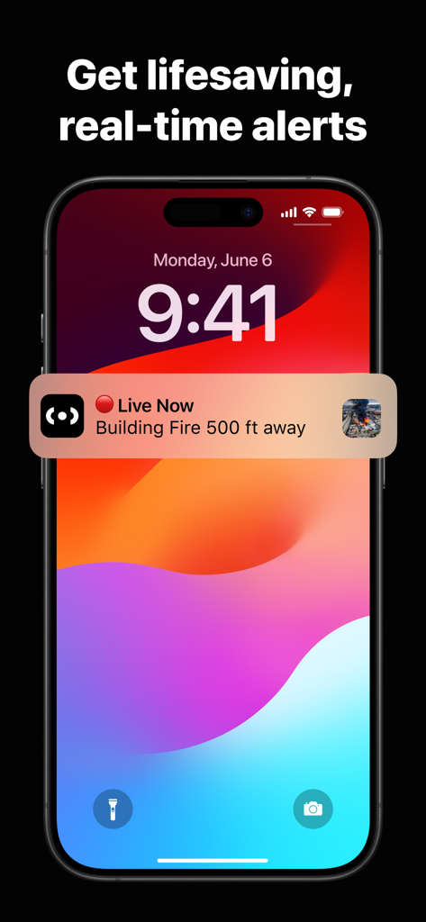 An iPhone lock screen showing a real-time Citizen app notification for a nearby building fire.