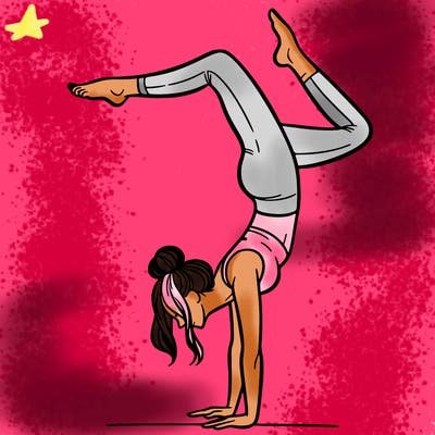 a woman doing a handstand