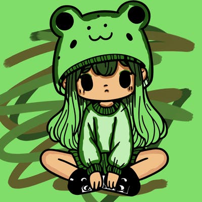 a girl wearing a frog hat and some frog socks