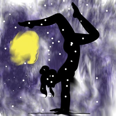 a woman doing a handstand