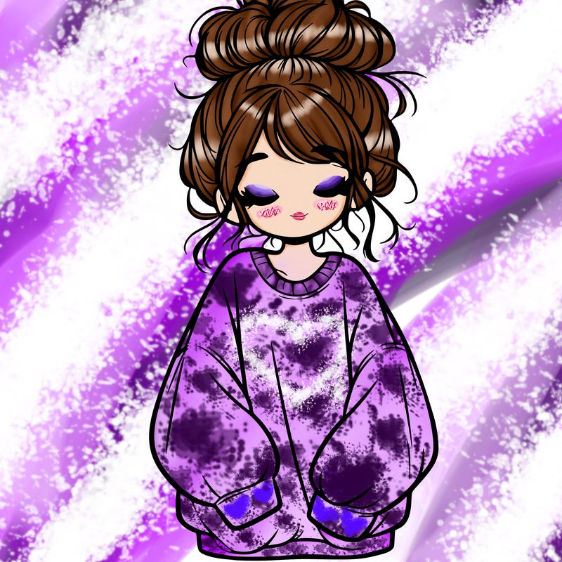 girl with baggy sweatshirt and messy bun