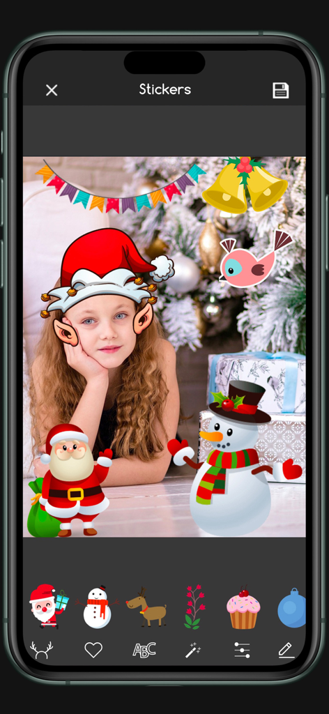 A girl's photo decorated with Santa hats and Christmas stickers in a mobile app interface