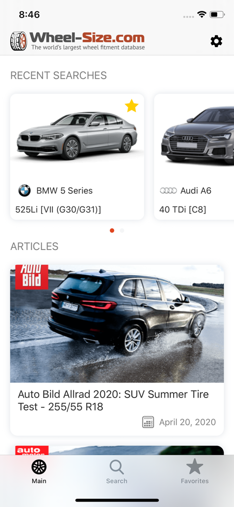 The main dashboard of the Wheel Size app displaying recent car searches for BMW and Audi and a tire test article.