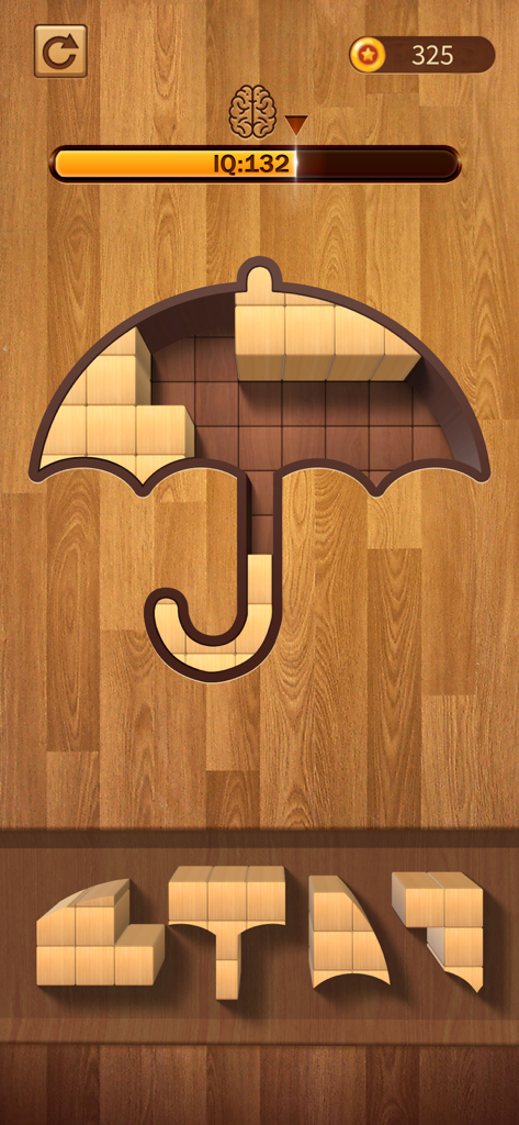 A wooden block jigsaw puzzle level with an umbrella shape and IQ progress bar