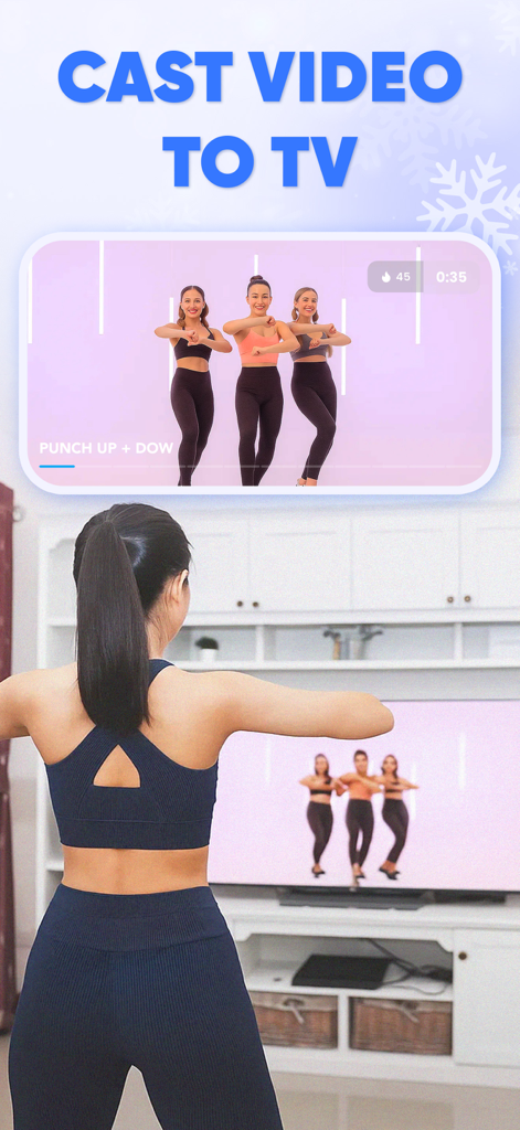 Woman following a dance workout at home cast onto a TV screen